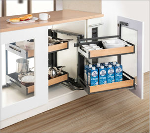 Da gaveta moderna do armário dos acessórios da cozinha do metal o canto mágico retira a cesta